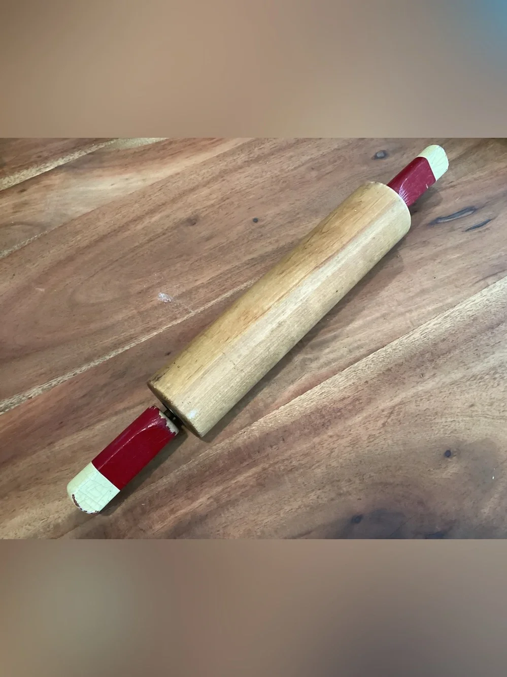 Vtg. American style wooden rolling pin with red and cream painted handles.